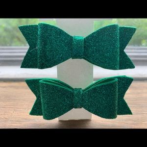 Pair of green hair bows